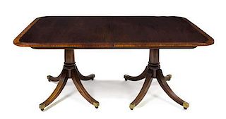 An American Georgian Style Extension Table, Baker, Height 28 1/4 x width 68 x depth 44 inches.