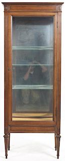 A Directoire Style Walnut Vitrine, Height 65 1/2 x width 25 1/2 x depth 15 inches.