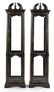 A Pair of American Ebonized and Partial Gilt Display Cabinets, Pulaski Furniture Company, Height 82 1/2 inches.