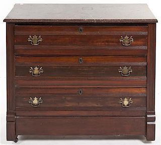 An American Victorian Walnut Chest of Drawers, Height 32 x width 38 x depth 17 1/2 inches.