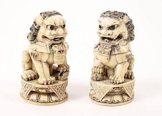 Pair of Chinese Carved Ivory Foo Dogs
