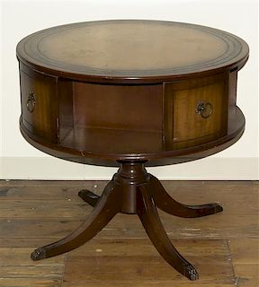 An American Mahogany Drum Table, Height 29 1/8 x diameter 31 3/4 inches.