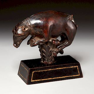 Antique wood carving of boar