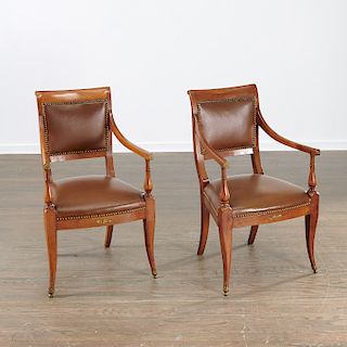 Pair Continental Neoclassic fruitwood armchairs