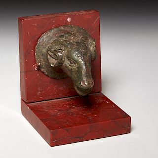 Ancient cast bronze rams head ornament