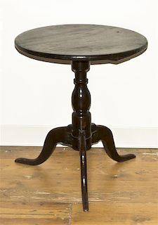 An American Mahogany Tea Table, Height 25 inches.