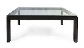 A Contemporary Steel and Glass Low Table, Height 16 x width 42 x depth 41 3/4 inches.