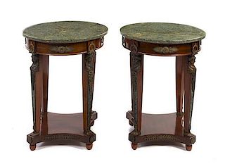 A Pair of Empire Style Gilt Metal Mounted Mahogany Occasional Tables, Height 31 3/8 x diameter 23 1/8 inches.