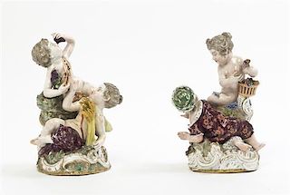 A Pair of Continental Porcelain Figural Groups, Height of first 9 1/4 inches.
