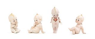 Four Kewpie Style Bisque Figures, Height of first 3 inches.