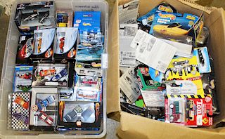two boxes full of Hot Wheels diecast cars