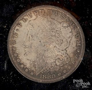 1880 Morgan silver dollar NCI MS 65.
