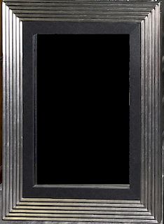 A Silvered Wall Mirror. Height 46 1/2 x width 35 7/8 inches.