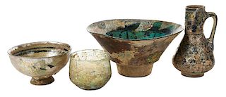 Four Iridescent Roman and Persian Table Items