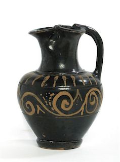 A Greek Pottery Oinochoe, Height 4 1/4 inches.