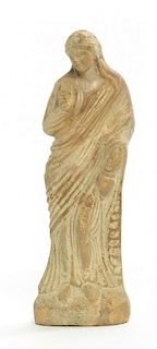A Greek Terra Cotta Figure, Height 7 3/8 inches.