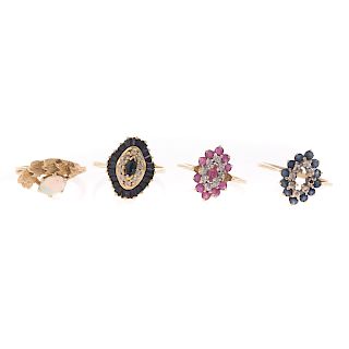 A Collection of 4 Gemstone Cluster Rings in Gold