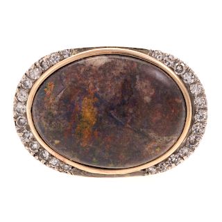 A Ladies Large Black Opal Ring in 14K Gold