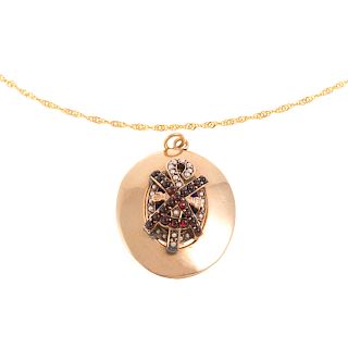 A Victorian Garnet & Seed Pearl Pendant with Chain