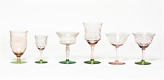 A Group of Thirty-Four Pink and Green Glass Stems, Height of tallest 6 1/2 inches.