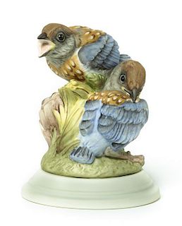 A Boehm Bisque Ornithological Group, Height 5 1/2 inches.