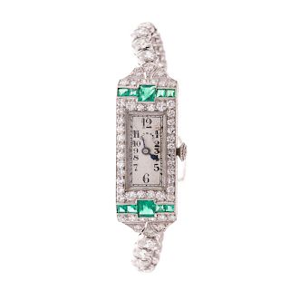 An Art Deco Diamond & Emerald Watch by Galt & Co