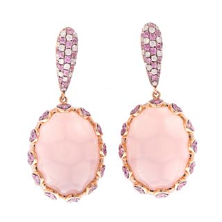 A Pair of Diamond & Pink Sapphire Earrings in 18K