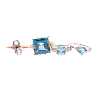 A Collection of Tanzanite & Topaz Rings in Gold