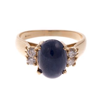 A Ladies Cabochon Sapphire & Diamond Ring in 14K