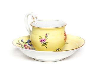 A Meissen Porcelain Teacup and Saucer, Height of teacup 3 1/4 inches.
