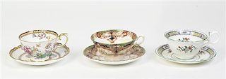 A Collection of Eight English Teacups and Saucers, Height of tallest teacup 3 1/4 inches.