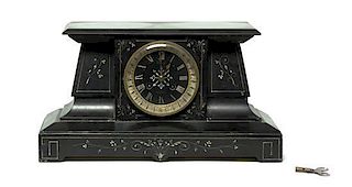 A Victorian Slate Mantel Clock, Width 15 3/8 inches.