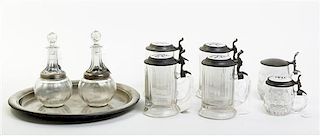 A Collection of Pewter and Pewter Mounted Articles, Diameter of tray 15 inches.