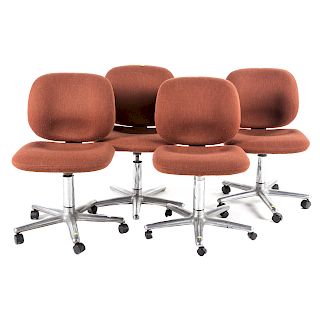 Four Herman Miller upholstered swivel chairs