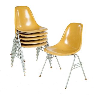 Six Eames molded fiberglass chairs