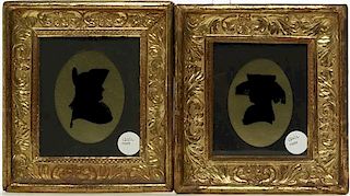 A Pair of English Reverse Painted Silhouettes, Height 3 3/4 x width 2 1/2 inches.