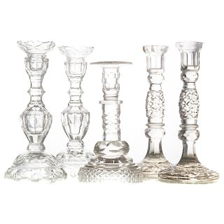 Two pairs of Anglo-Irish cut glass candlesticks