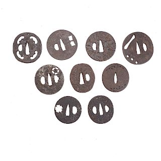 Nine Japanese cast iron tsubas