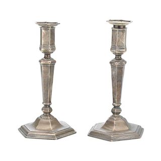 A PAIR OF TANE STERLING SILVER CANDLESTICKS.