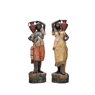 A PAIR OF POLYCHROME TERRACOTTA WATER CARRIERS. 