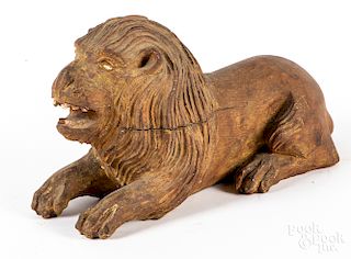 Carved recumbent lion