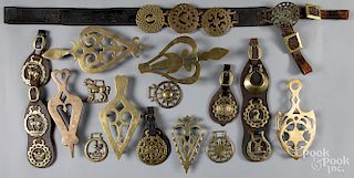 Collection of horse brasses and trivets.