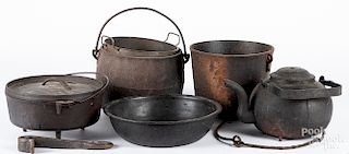 Group of early cast iron kettles and pots, etc.