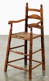 Red stained highchair, ca.1800.