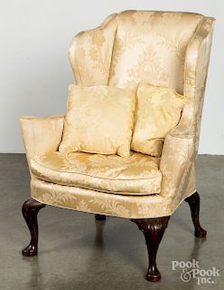 Queen Anne style mahogany wing chair.