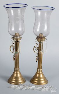 Pair of brass lamps with etched shades and prisms