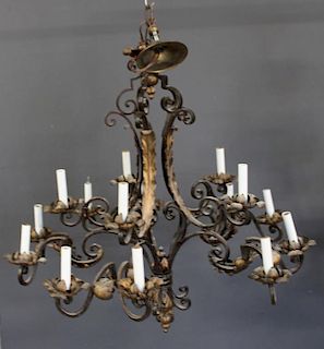 Patinated Iron and Gilt Decorated Chandelier.