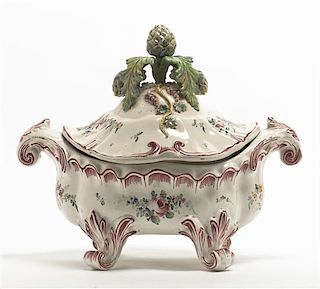 An Italian Faience Tureen, Width over handles 16 inches.