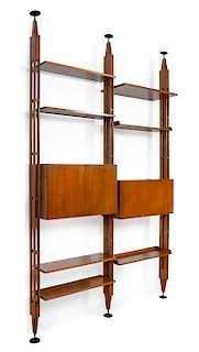 Franco Albini, (Italian, 1905-1977), Poggi, c. 1957 wall unit comprised of three uprights, seven shelves, and two cabinets