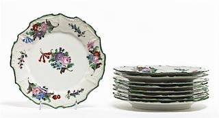 A Set of Nine Porcelain Dinner Plates, retailed by A. Schmidt & Son, Diameter 10 inches.